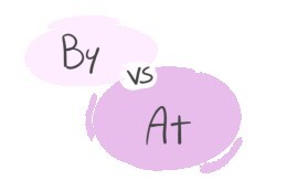 "By" vs. "At" in the English grammar